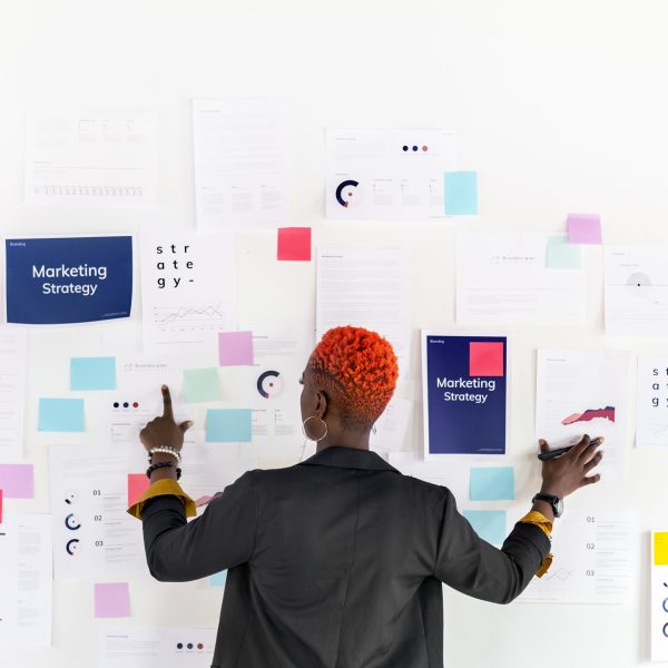 Cool black businesswoman planning a marketing strategy